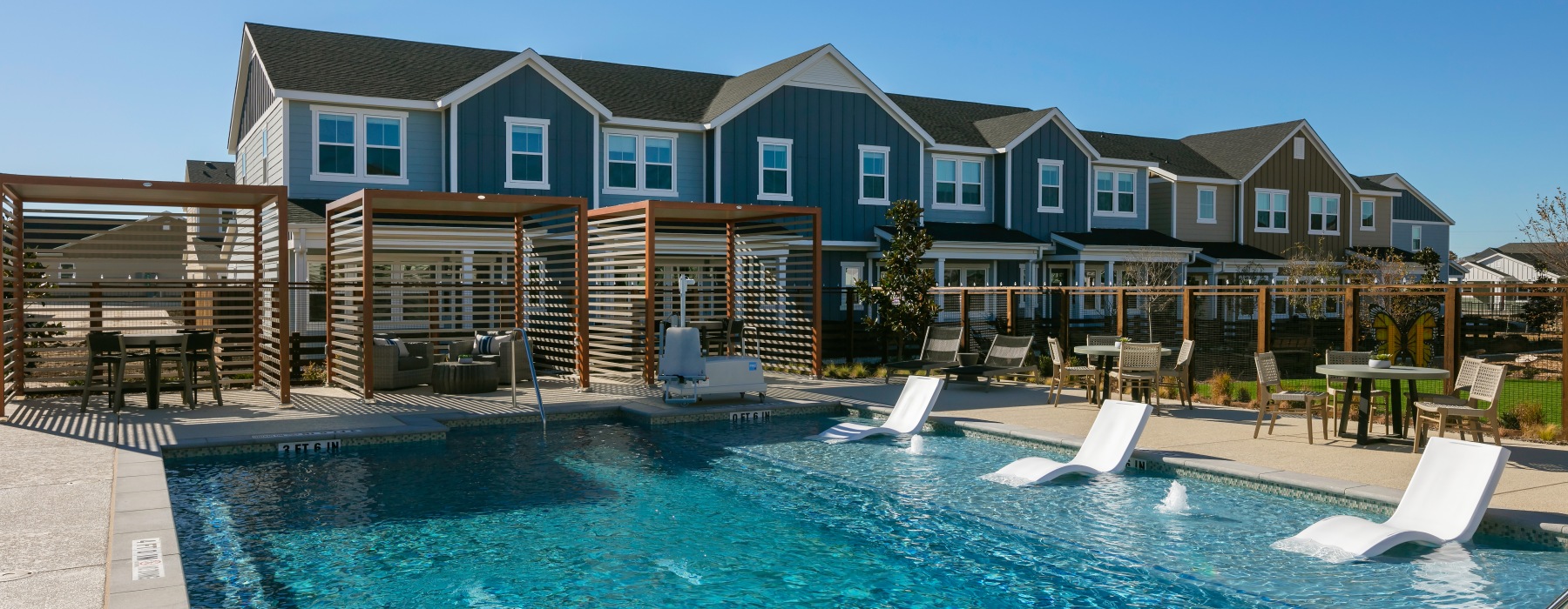 Resort inspired pool with sundeck