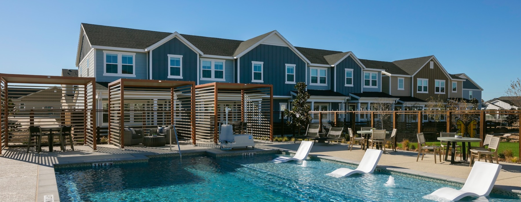 Resort inspired pool with sundeck