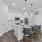 spacious kitchen with island and walk-in pantry