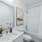 Bathroom with large soaking tub and vanity